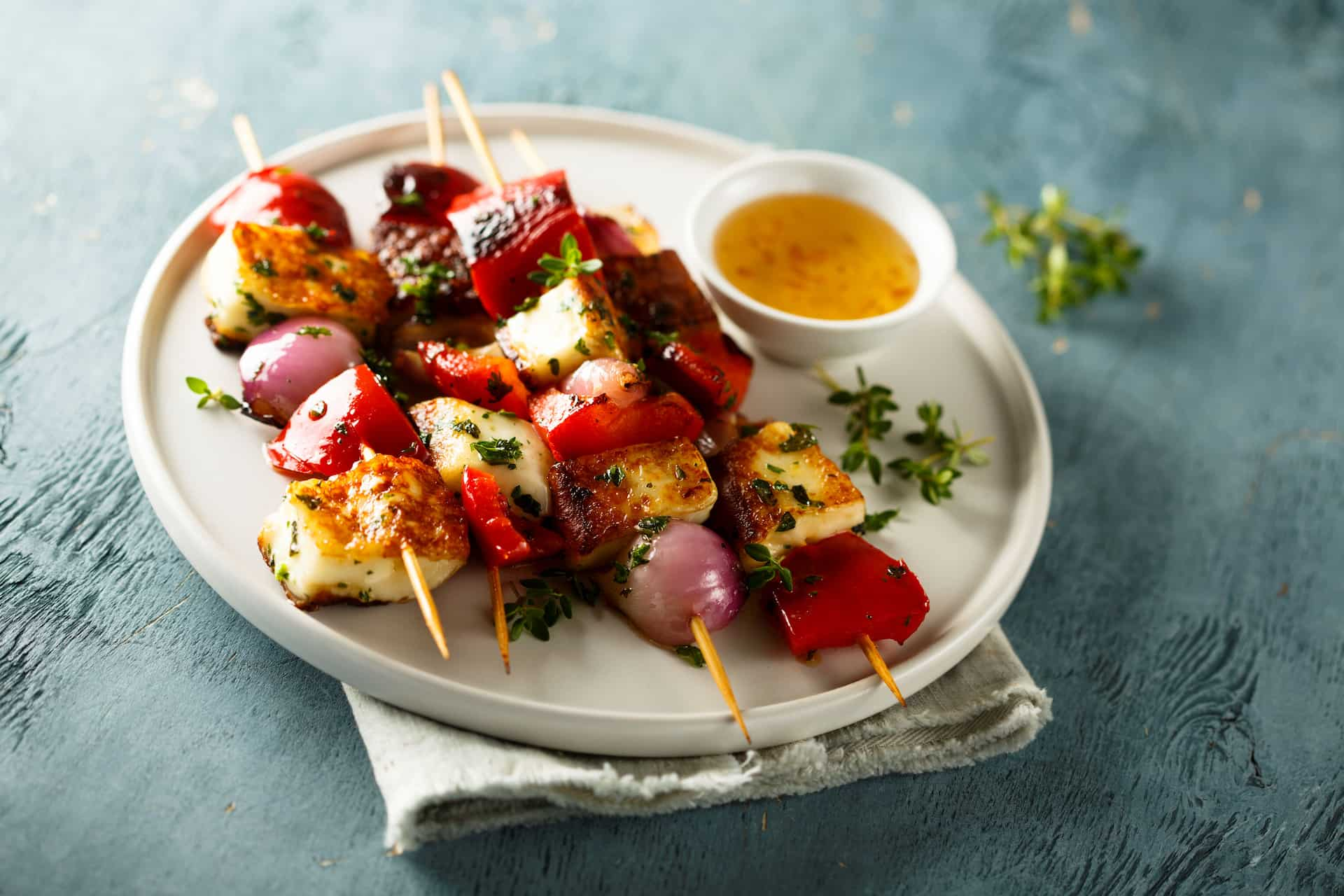 Tasty BBQ halloumi skewers cooked using an LPG BBQ powered by Calor Gas