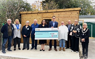 Calor handing donation cheque to Canvey residents and MP