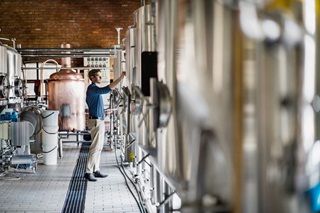 Man working in a distillery