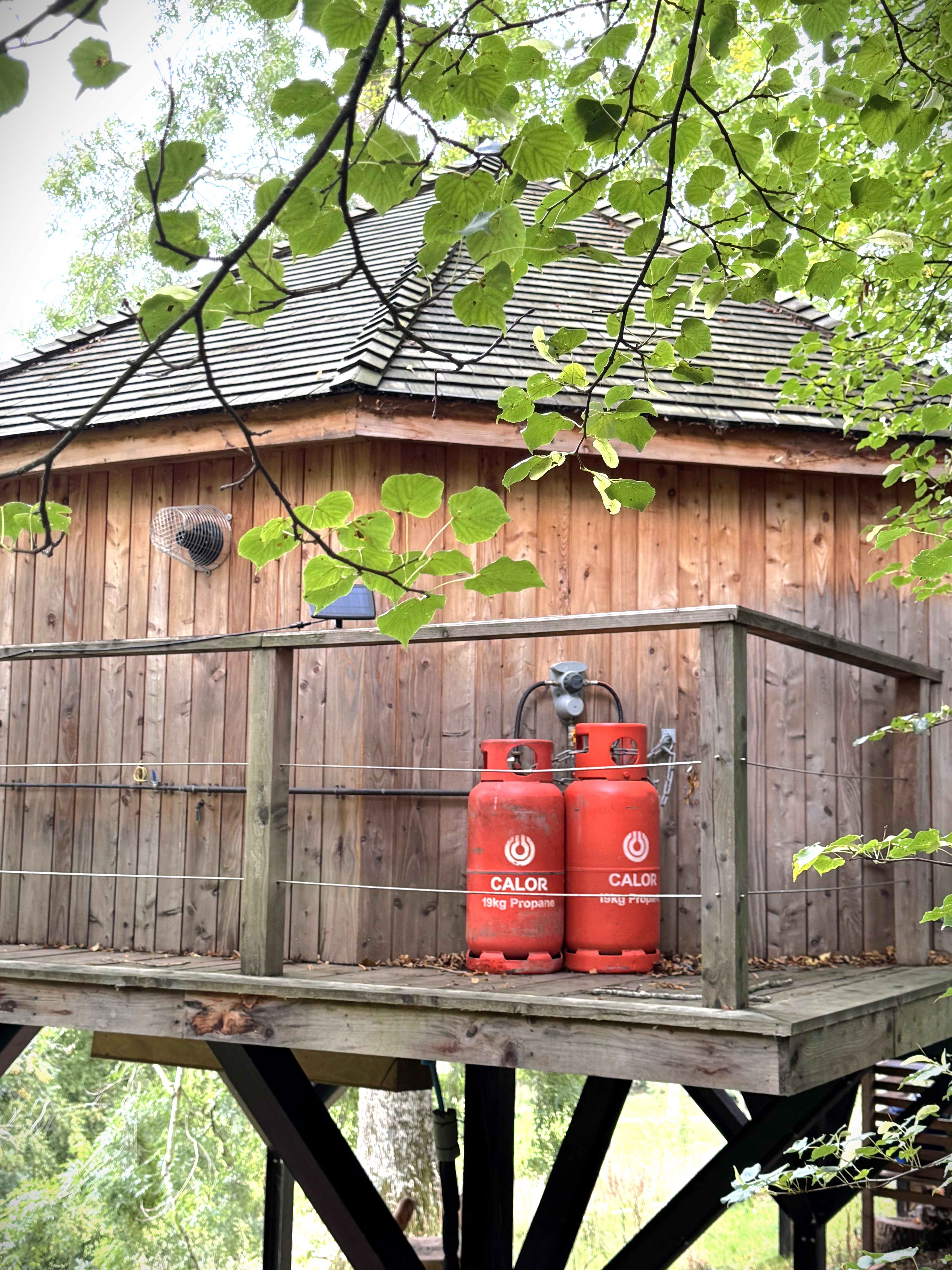 The fold cabin with Calor cylinders positioned outside of it