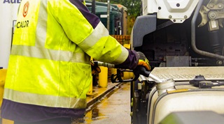 Calor LPG delivery driver re-fuelling the delivery vehicle with HVO