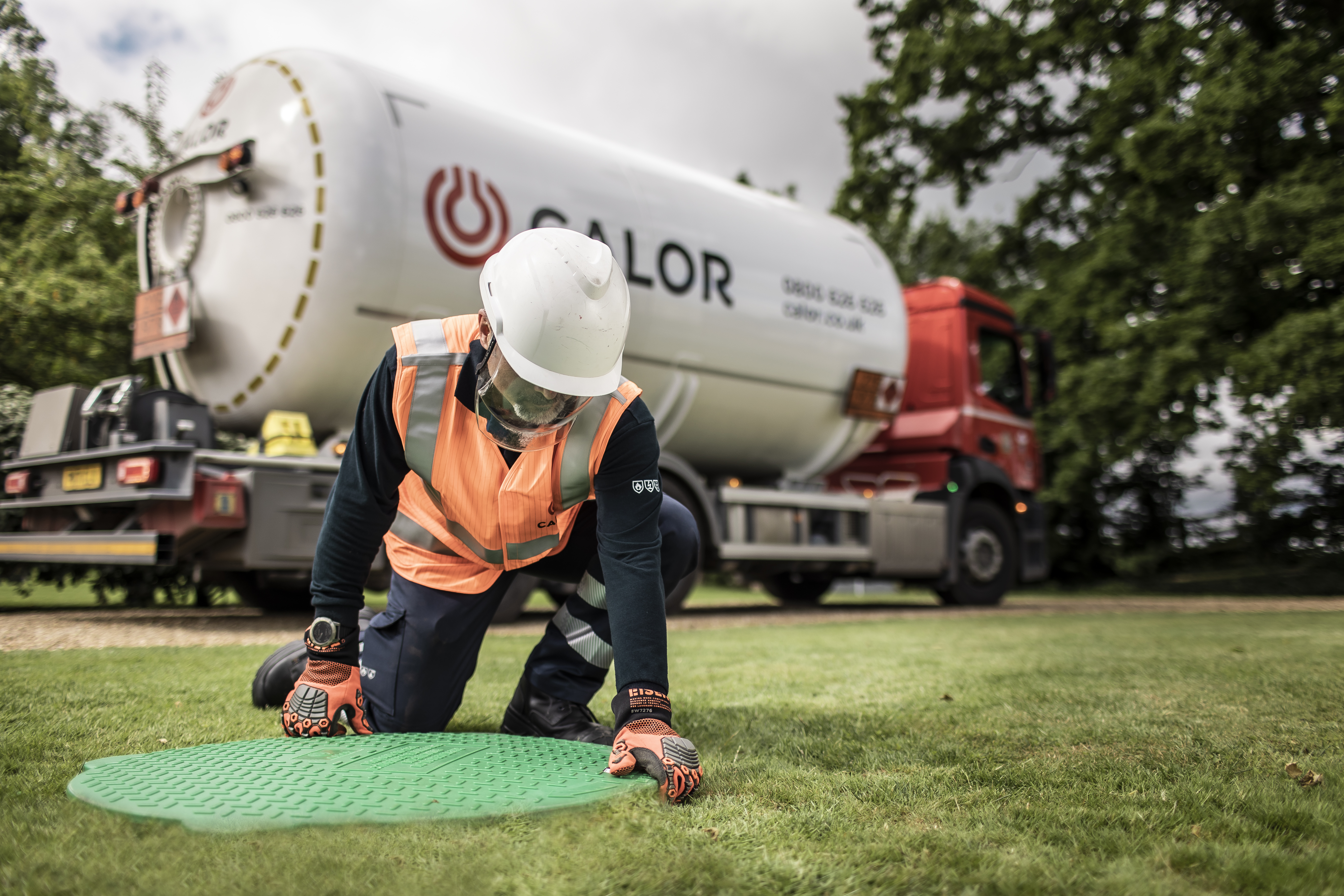 Calor engineer attending to a below ground tank